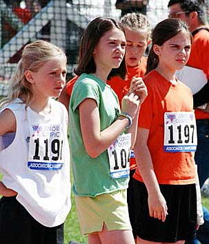 Young female track athletes at a meet