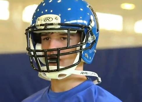 Brad Davis wearing Rawlings football helmet