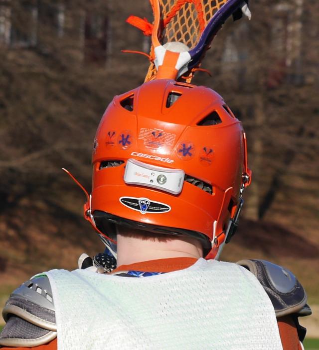 Brain Sentry sensor on lacrosse player's helmet