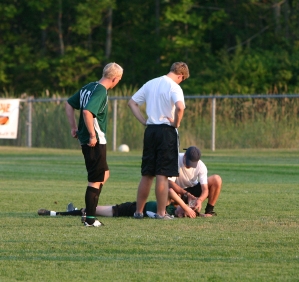 Soccer player being treated for concussion