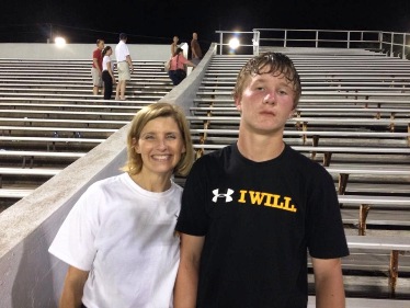 Gretchen Rose and her son after first football game