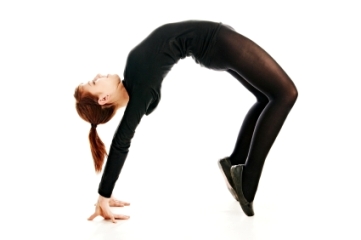 Gymnast bending over backwards