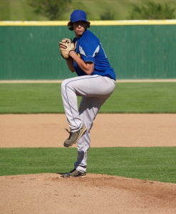 High school pitcher in windup