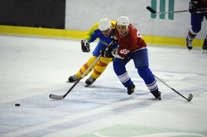 Ice hockey players fighting for the puck