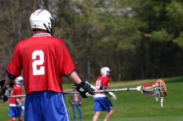 Lacrosse player watching play
