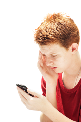 Boy receiving a text message