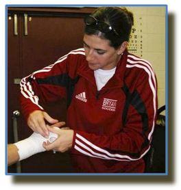 Marci Yost taping athlete's ankle