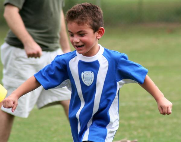 Young soccer player having fun
