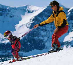 Man and child skiing